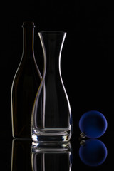 The bottle of wine,glass carafe and Christmas decoration