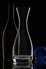 The bottle of wine,glass carafe and Christmas decoration