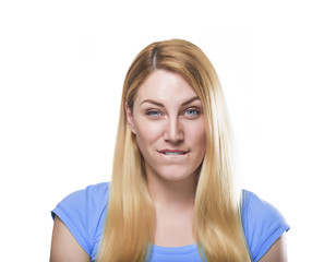 Fototapeta premium Blond woman bit her lip.