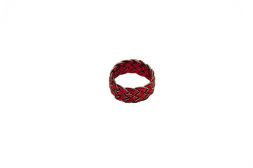 Wicker material red and black ring isolated by white background