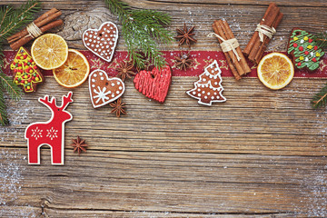 Fototapeta na wymiar Christmas wooden background with gingerbread