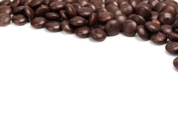 Top right frame of brown chocolate candy on white background