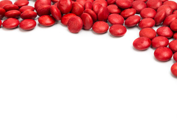 Top right frame of red chocolate candy on white background