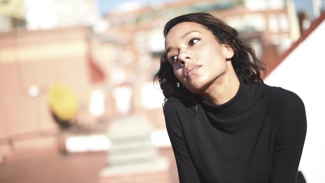 Beautiful young woman in urban environment