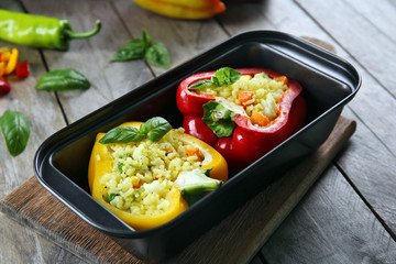 Stuffed peppers with vegetables on table close up
