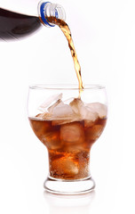 Cola soft drinks in glass on white background