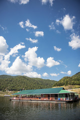 Floating house in the lake Bhumibol Dam Tak ,Thailand.