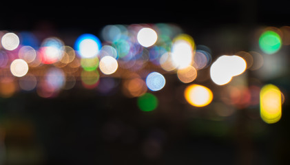 Abstract circular bokeh background of light on night