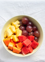 Top view of Fruits and Berries: water-melon, pineapple, papaya, grapes