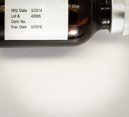 label expiration  medicine on bottle