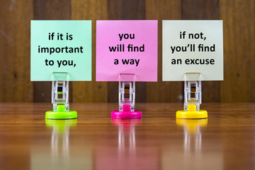 Word quotes of IF IT IS IMPORTANT TO YOU,YOU WILL FIND A WAY,IF NOT YOU'LL FIND AN EXCUSE on colorful sticky papers against wooden textured background.