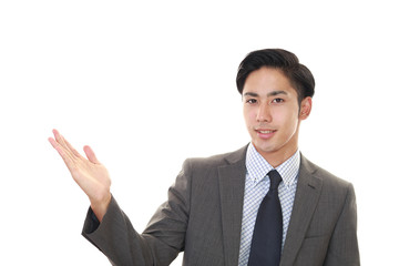 案内するビジネスマン