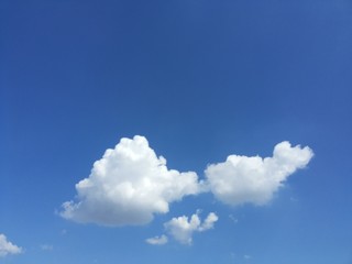 Naklejka na ściany i meble Cloud on blue sky background