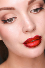 Naklejka premium Close up portrait of beautiful young woman face
