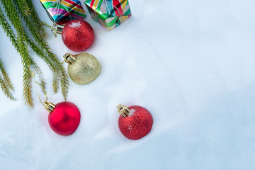 Christmas balls decorations on snow