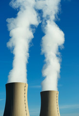 Nuclear power plant on a sky background in sunlight