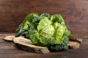 Savoy cabbage on cutting board closeup