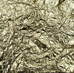 Shiny yellow leaf gold foil texture background