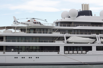 Naklejka premium Luxury yacht with helicopter