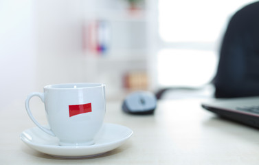 Cup of cooffee on office desk