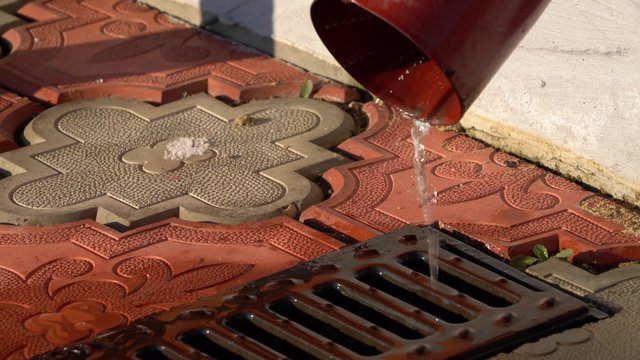 Drain Pipe with Flowing Water after Rain