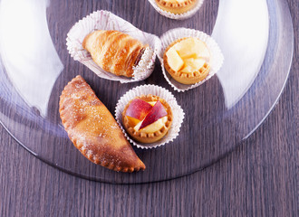 Pastries under glass