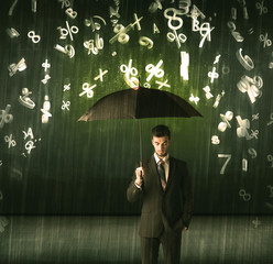 Businessman standing with umbrella and 3d numbers raining concep