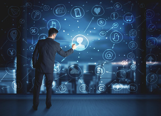 Businessman drawing social media connection scheme