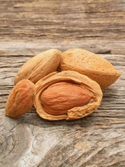 Almond on wooden background