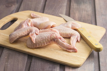 crude chicken wings close up