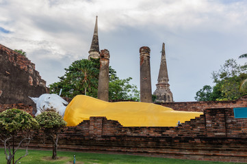 Ancient reclining buddha in public temple of Ayutthaya