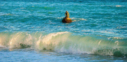 The sculpture of a mermaid in the sea opposite the promenade in Mishor in Crimea