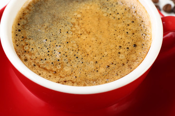 View on coffee foam in the cup, close-up