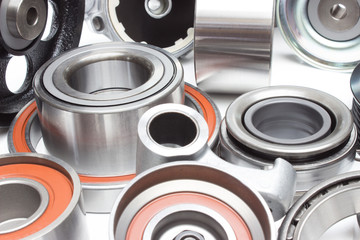 Group bearings and rollers (automobile components) for the engine and chassis suspension