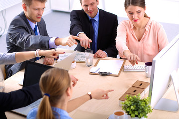 Business meeting -  manager discussing work with his colleagues