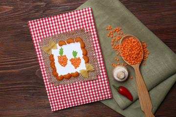 Decorated cookbook on wooden background
