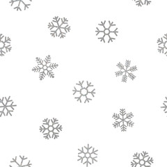 Seamless pattern of falling silver snowflakes.
