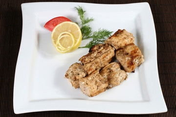 grilled succulent meat with vegetables