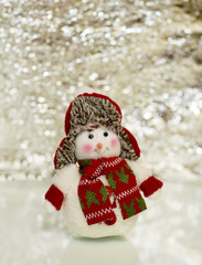 Snowman on a silver background.