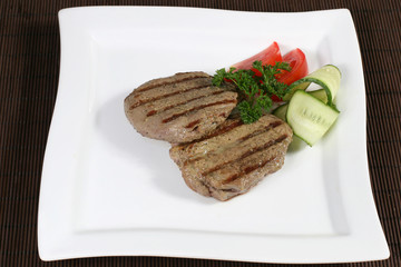 grilled succulent meat with vegetables