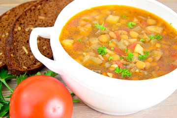 Lentil soup with eggplant, tomatoes and onions