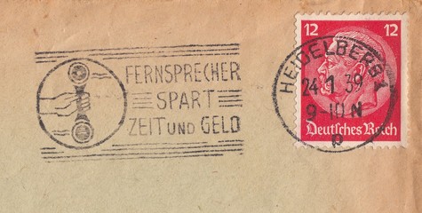 Standard postage stamp Hindenburg with the original cancellation of the old postal envelope, Deutsches Reich 1939.