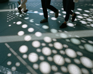 People walking in modern architecture