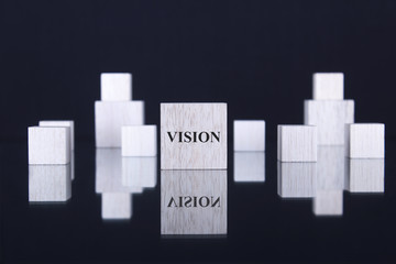 Vision written on a wooden cube