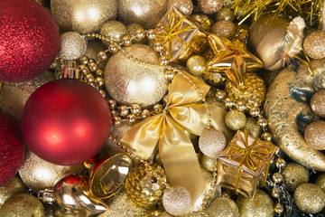 Christmas red balls on gold background.