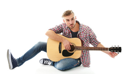 Young musician with guitar isolated on white