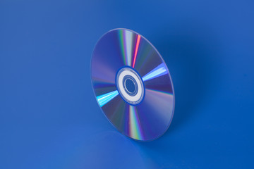 Compact disk on blue background