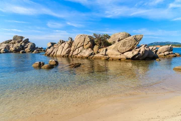 Photo sur Plexiglas Plage de Palombaggia, Corse Rocks in sea water on Palombaggia beach, Corsica island, France