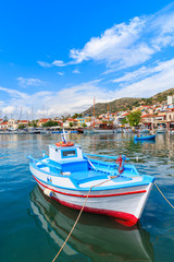 Fototapeta na wymiar Traditional colourful Greek fishing boat in Pythagorion port, Samos island, Greece