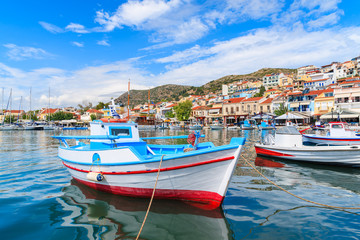 Fototapeta na wymiar Traditional colourful Greek fishing boat in Pythagorion port, Samos island, Greece